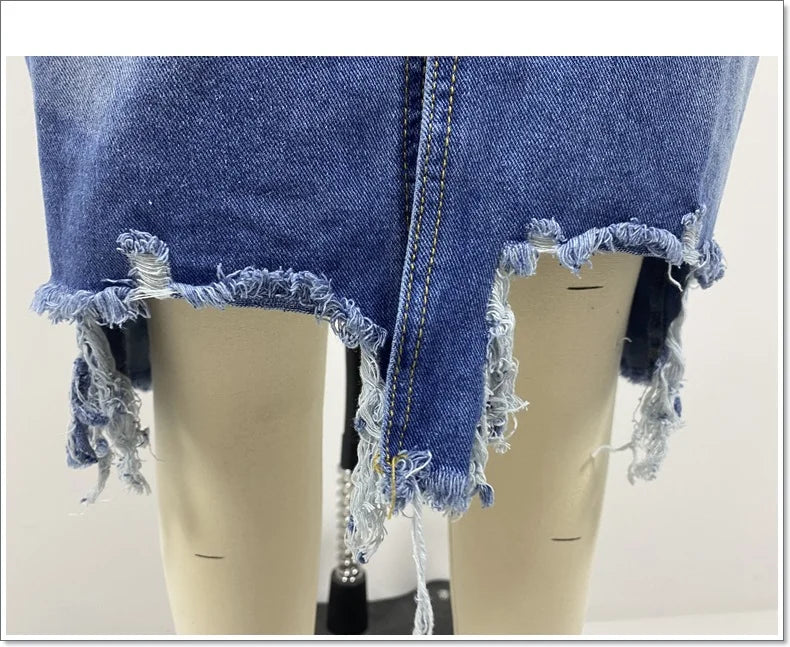 Irregular Holes In A Fringed Denim Skirt