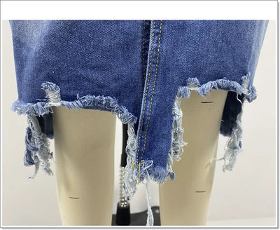 Irregular Holes In A Fringed Denim Skirt