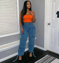 Wide Jeans With Several Pockets