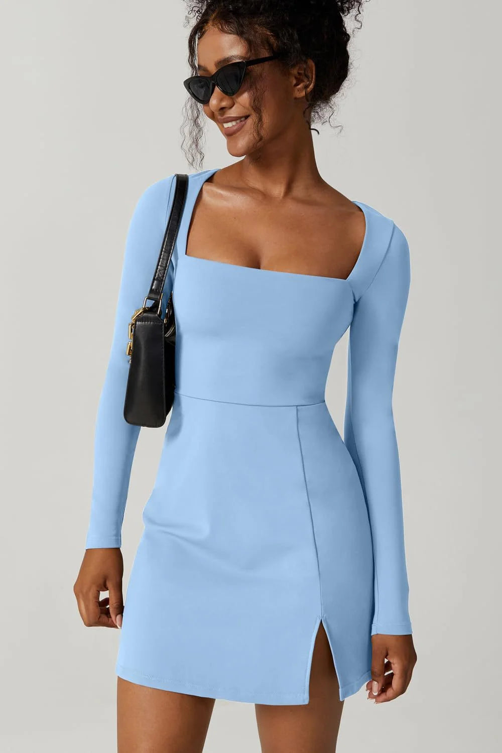 Tight fitting corset long sleeved slit flared mini dress
